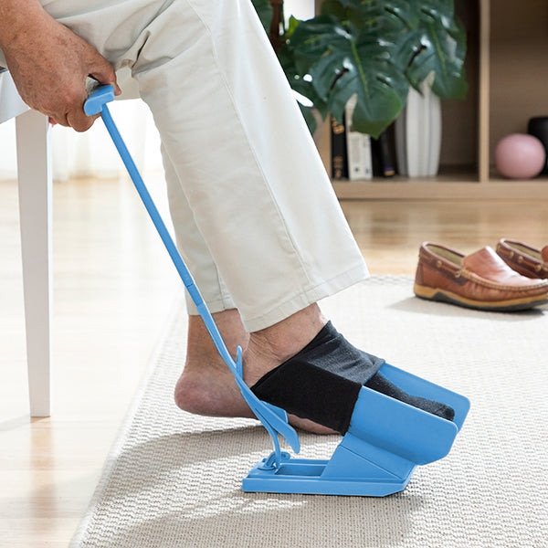 Aparat pentru încălțat șosete